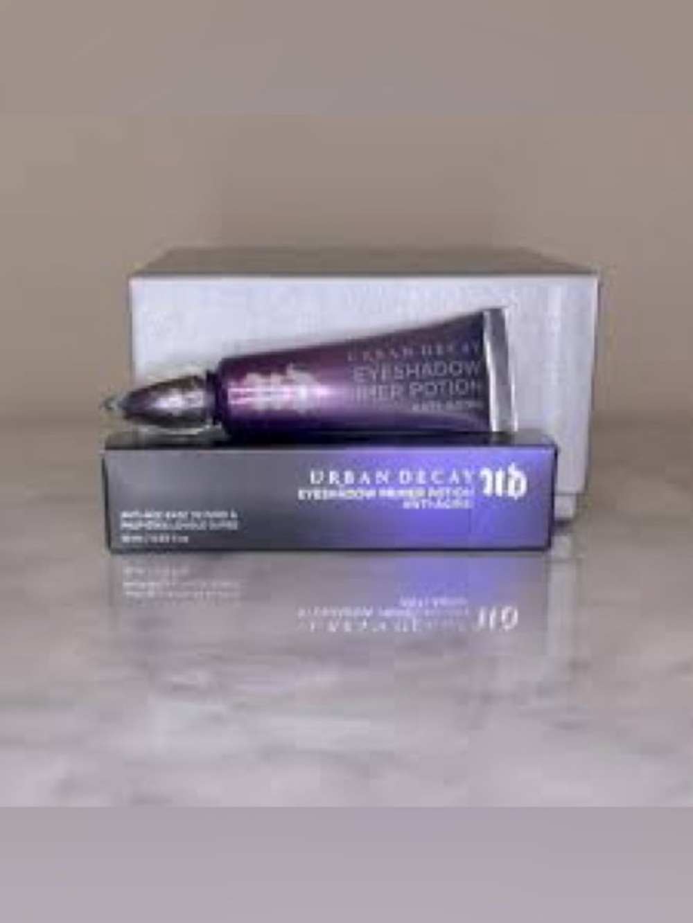 Urban Decay Eyeshadow Primer Tube in Purple Metallic Packaging